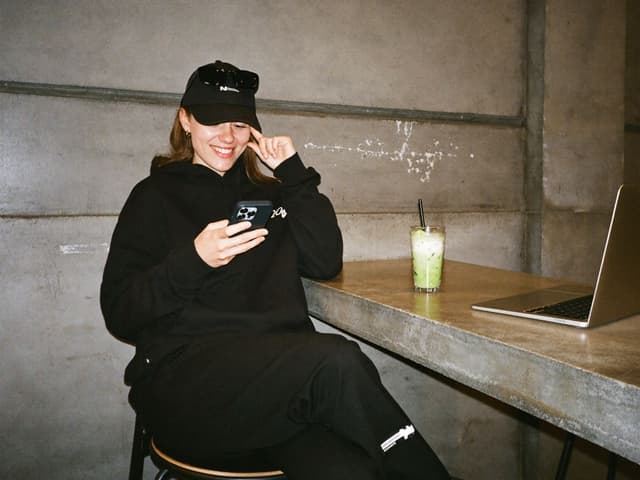Operator working on a laptop at a creative desk